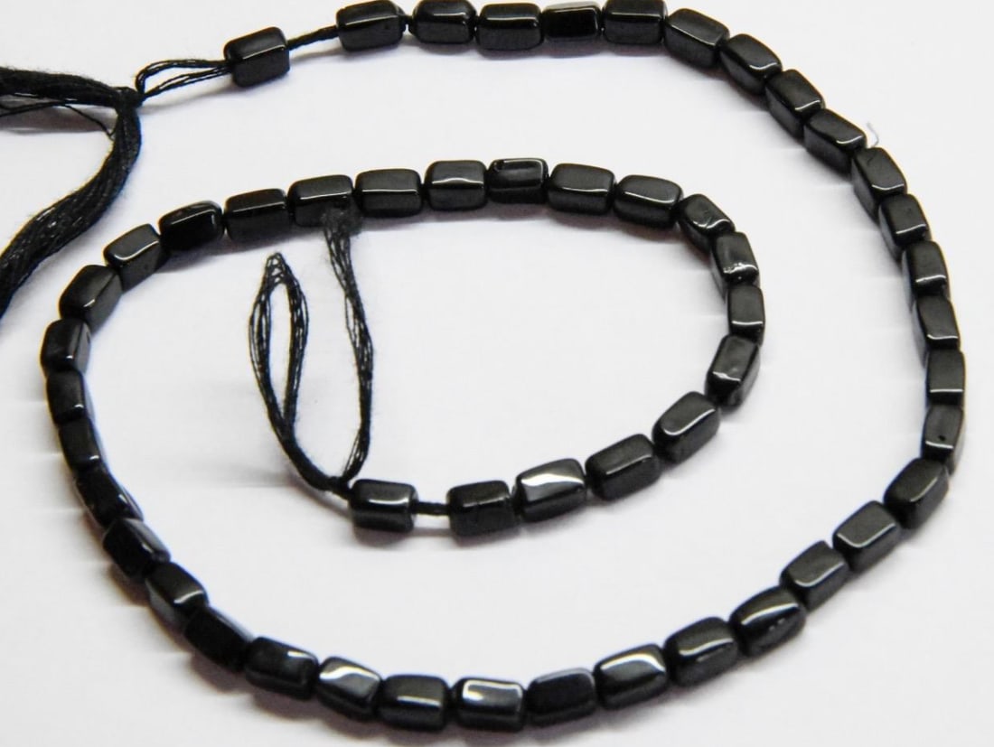 NATURAL BLACK STONE BEADS CUBE 3.5X5.5 - 4X6.5 MM, 13'' STRAND (1 of 2)
