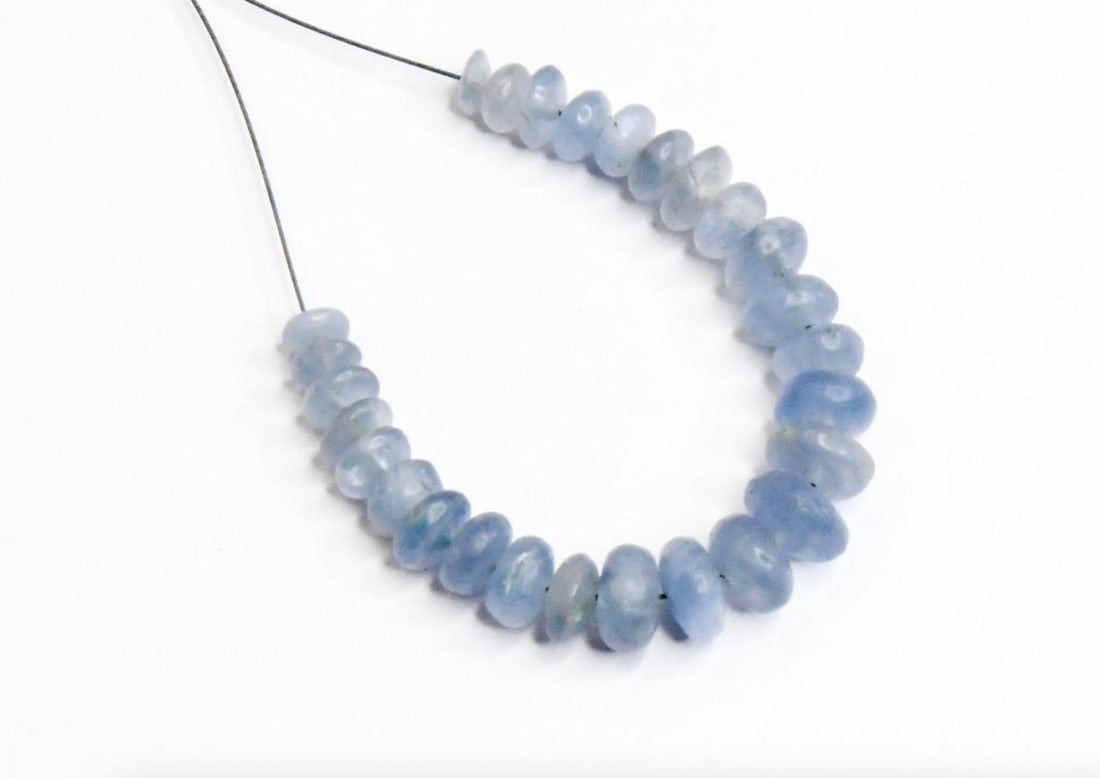 NATURAL TANZANITE BEADS RONDELLE 3.5 - 6 MM 27 PCS: These are natural, earth mined and hand crafted with precision. Stone: Tanzanite, Stone Shape: Rondelle, Stone Size: 3.5 - 6 mm, Weight: 17 carats. The photographs are generally enlarged to show the c