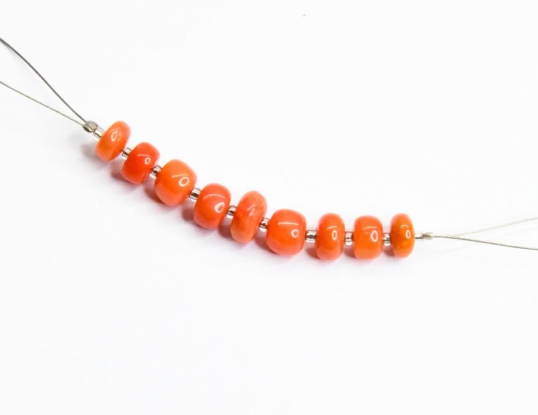 ETHIOPIAN OPAL (DYED) BEADS RONDELLE 5.5 - 6.5 MM 9 PCS (2 TASSELS): These are natural, earth mined and hand crafted with precision. Stone: Ethiopian Opal (Dyed), Stone Shape: Rondelle, Stone Size: 5.5 - 6.5 mm, Width: 2.5 - 3.5 mm. The photographs are generally enlarg