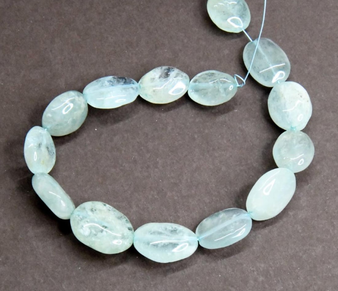 NATURAL AQUAMARINE BEADS OVAL 9X12 - 13X17 MM, 7" STRAND (1 of 2)