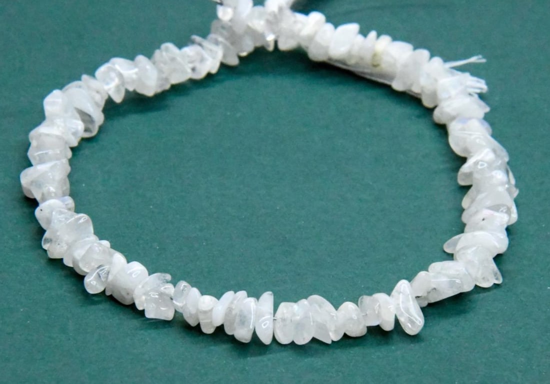 NATURAL RAINBOW MOONSTONE BEADS CHIPS 3X4 - 4X8 MM, 9" STRAND: These are natural, earth mined and hand crafted with precision. Stone: Rainbow Moonstone, Stone Shape: Chips, Stone Size: 3x4 - 4x8 mm, Width: 1 - 3 mm, Weight: 52 carats. The photographs are generall