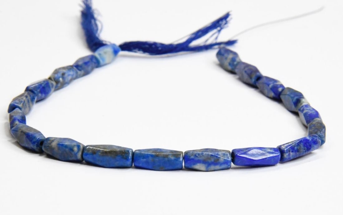 NATURAL LAPIS BEADS TWISTED 4X12 - 4X12m MM, 9" STRAND (1 of 2)