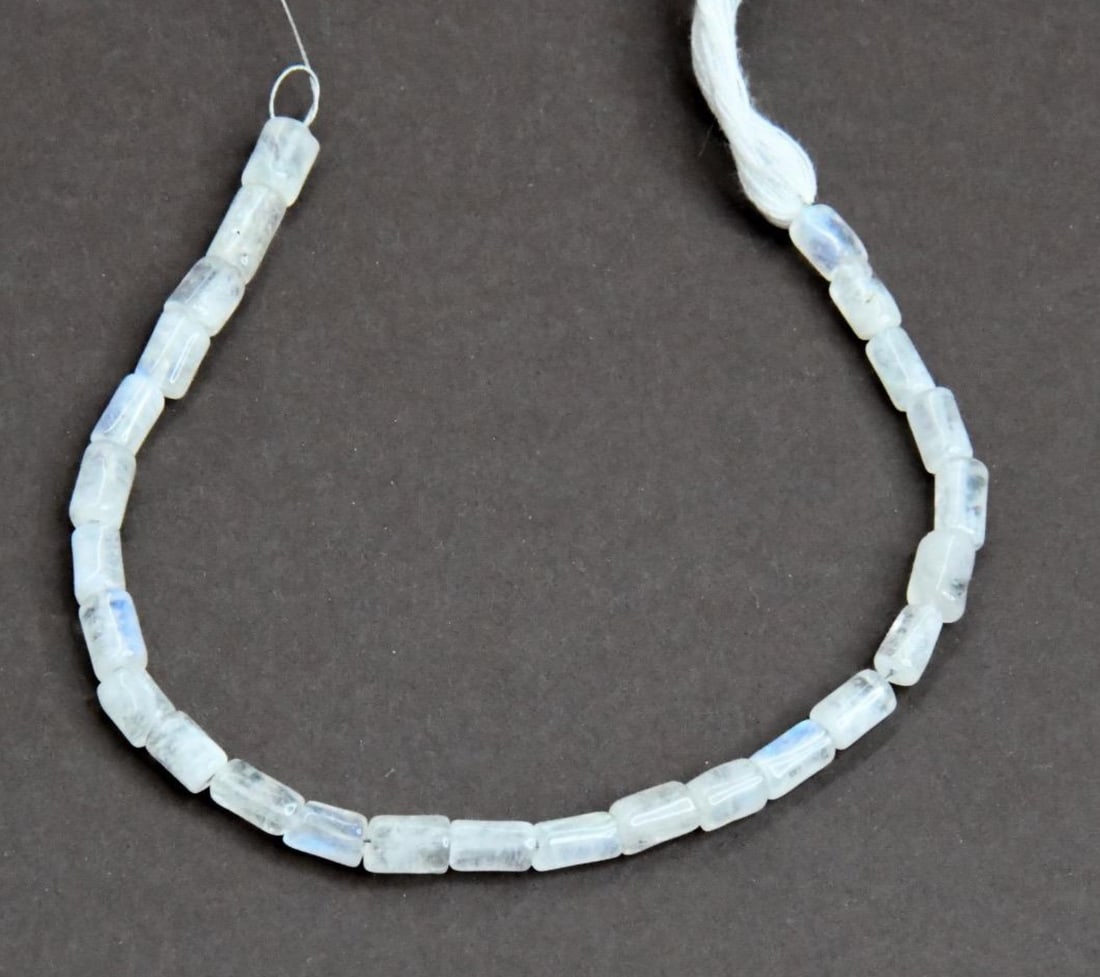 NATURAL RAINBOW MOONSTONE BEADS TUBE 3X5 - 4X6, 6" STRAND (1 of 2)