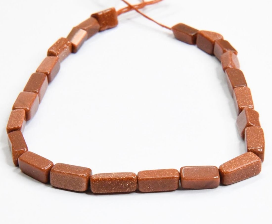 NATURAL GOLD STONE BEADS CUBE 4X6 - 4X10 MM, 8" STRAND (1 of 2)