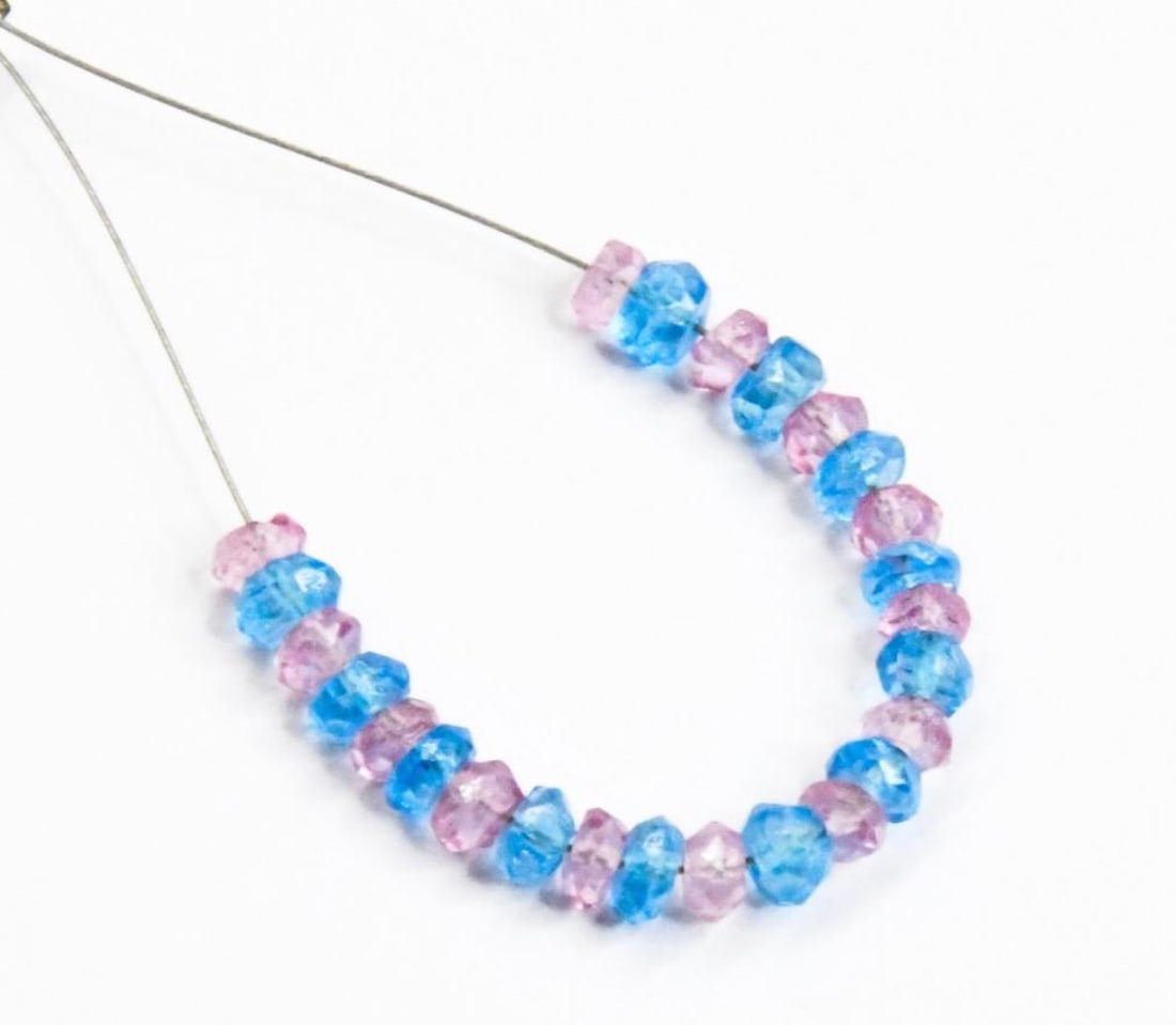 PINK & BLUE TOPAZ (COATED) BEADS FACETED RONDELLE 3.5 MM, 25 PCS (5 TASSELS): These are natural, earth mined and hand crafted with precision. Stone: Pink & Blue Topaz, Stone Shape: Faceted Rondelle, Stone Size: 3.5 mm, Width: 1.5 - 2.5 mm, Weight: approx. 7 carats. The photogra