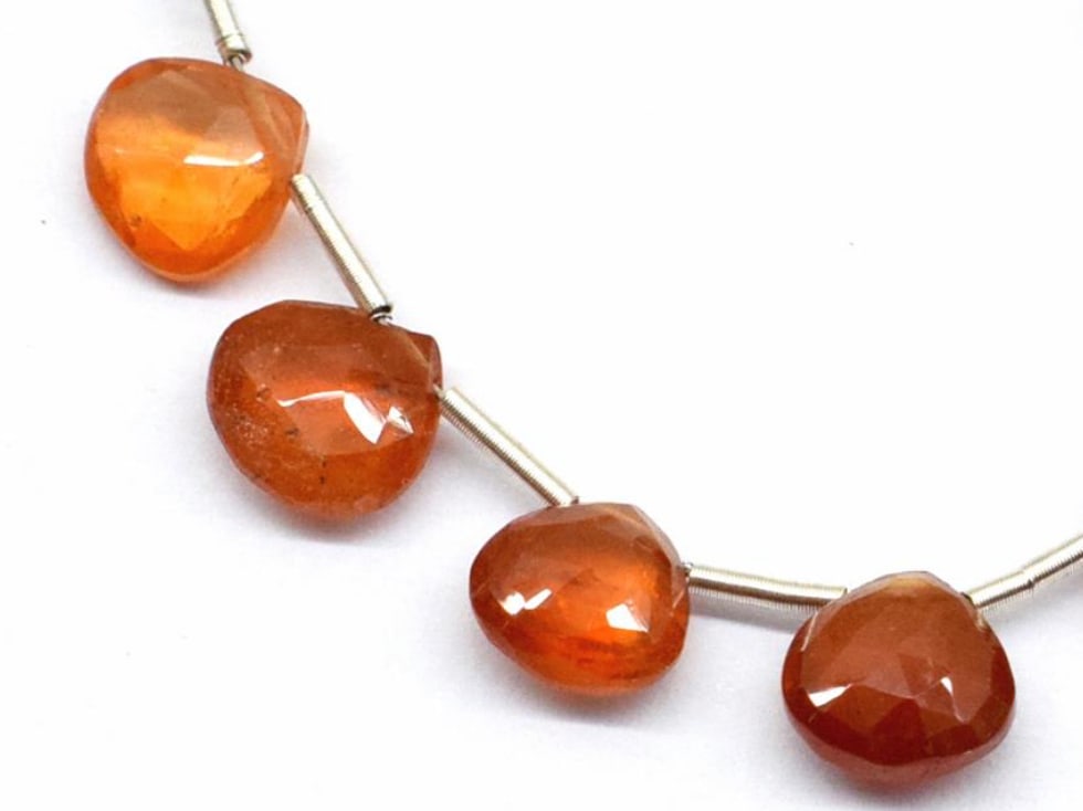 NATURAL SPESSARTITE GARNET BEADS FACETED HEART 6 - 6.5 MM 4 PCS (2 TASSELS): These are natural, earth mined and hand crafted with precision. Stone: Spessartite Garnet, Stone Shape: Faceted Heart, Stone Size: 6 - 6.5 mm, Width: 2.5 - 3 mm, Weight: approx. 4.65 carats. The photo