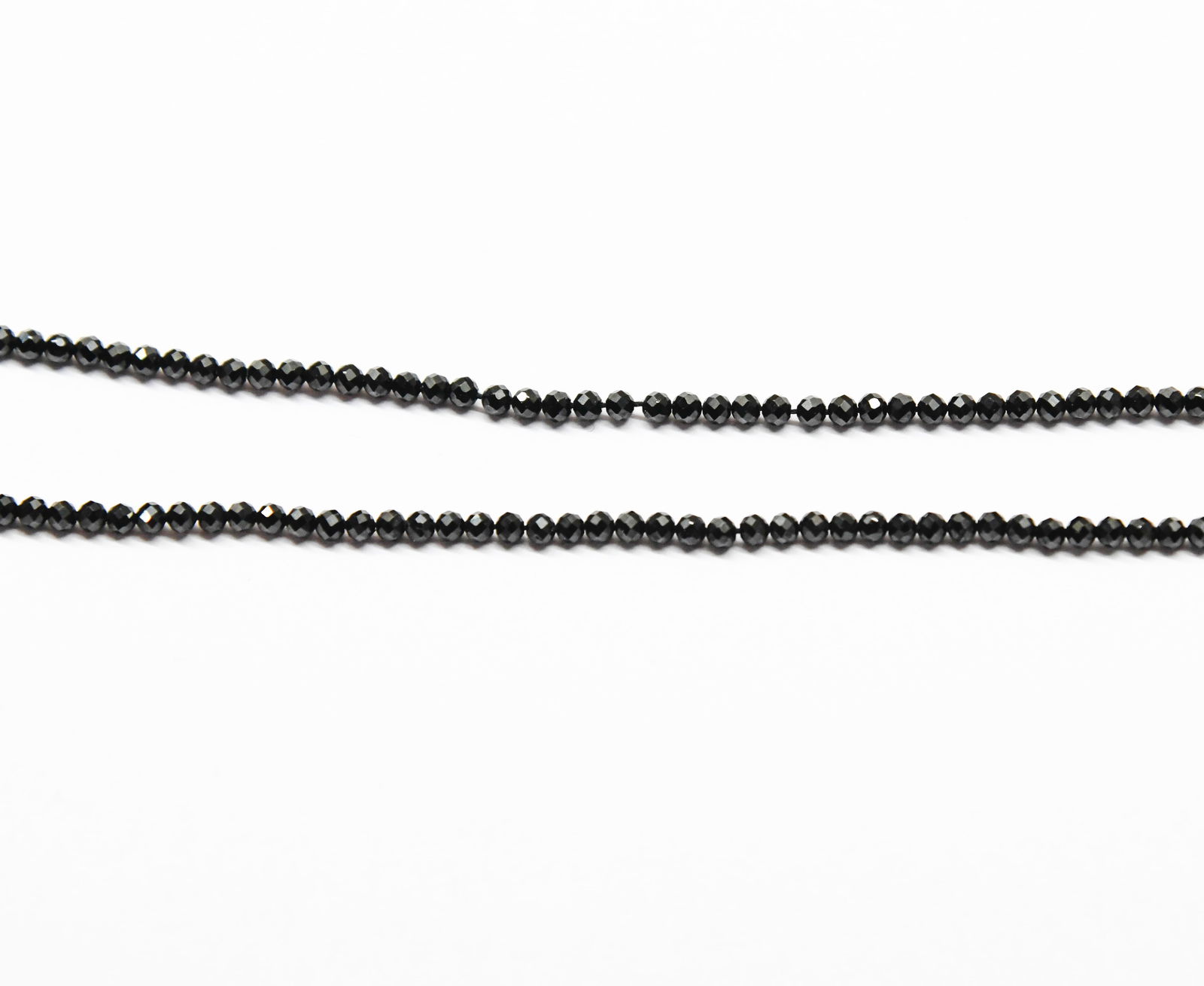 NATURAL BLACK SPINEL BEADS FACETED ROUND 3 MM 6" STRAND (3 LINES): These are natural, earth mined and hand crafted with precision. Stone: Black Spinel, Stone Shape: Faceted Round, Stone Size: 3 mm, Weight: approx. 15.4 carats. The photographs are generally enlarged t