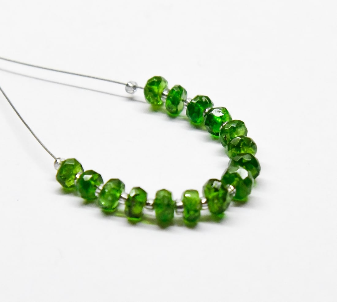 NATURAL CHROME DIOPSIDE BEADS FACETED RONDELLE 3.5 - 4.5 MM 15 PCS (2 TASSELS): These are natural, earth mined and hand crafted with precision. Stone: Chrome Diopside, Stone Shape: Faceted Rondele, Stone Size: 3.5 - 4.5 mm, Width: 1.5 - 2.5 mm, Weight: approx. 5.6 carats. The pho