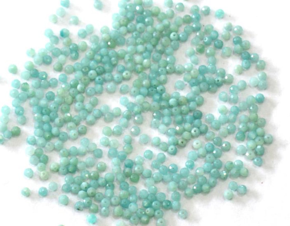 NATURAL AMAZONITE BEADS FACETED ROUND 2 MM - 50 PCS: These are natural, earth mined and hand crafted with precision. Stone: Amazonite, Stone Shape: Faceted Round, Stone Size: 2 mm, Weight: approx. 4 carats. The photographs are generally enlarged to show