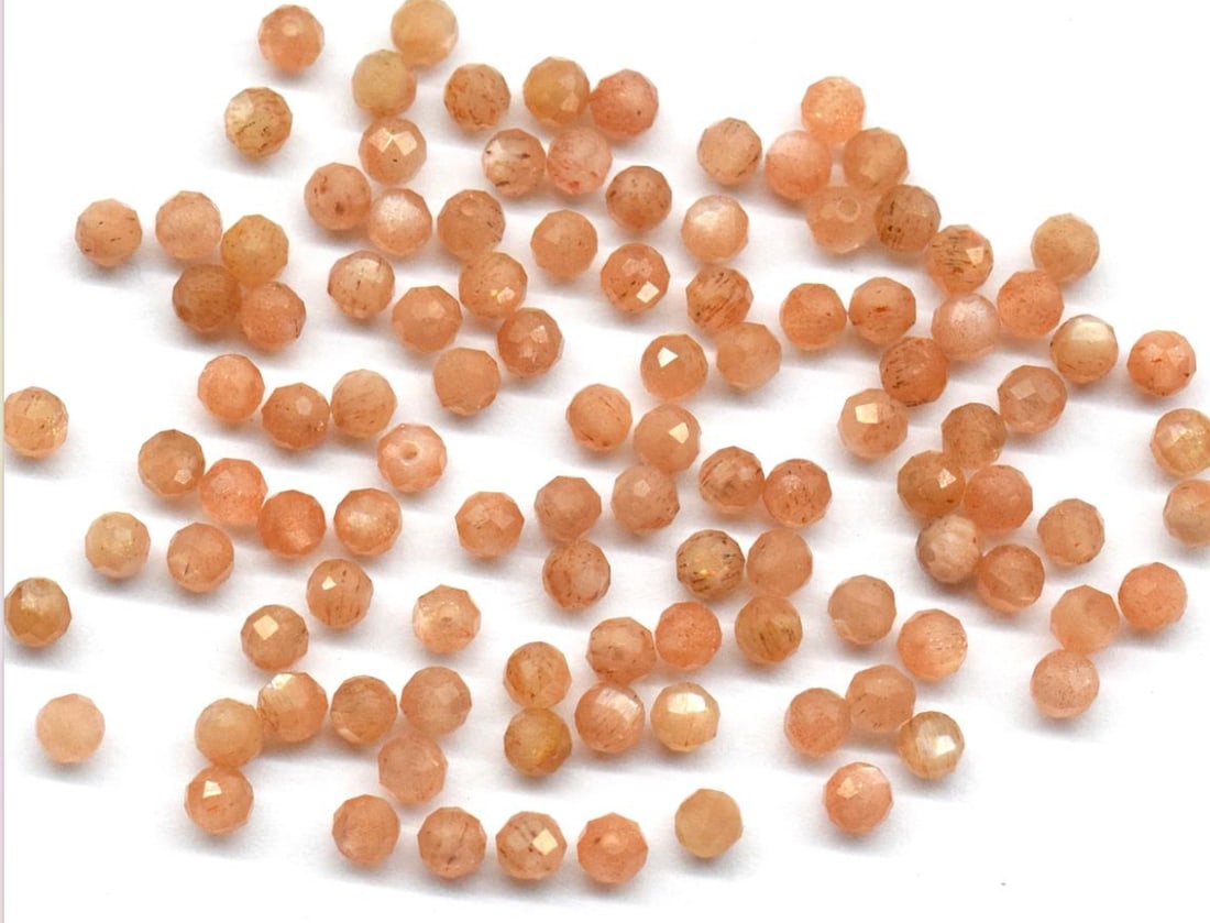 NATURAL SUNSTONE BEADS FACETED ROUND 3 MM - 50 PCS: These are natural, earth mined and hand crafted with precision. Stone: Sunstone, Stone Shape: Faceted Round, Stone Size: 3 mm, Weight: approx. 10.50 carats. The photographs are generally enlarged to s