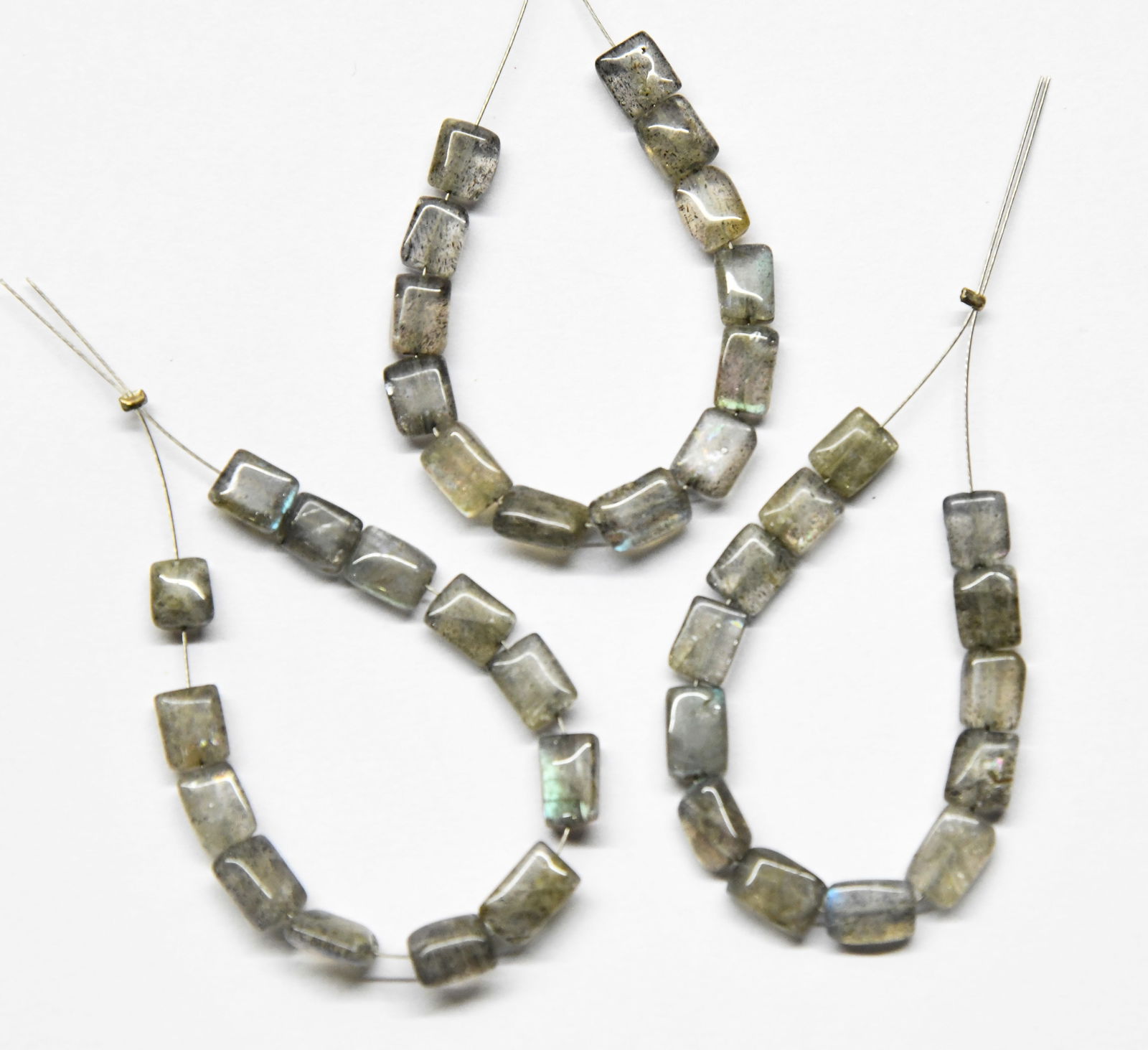 NATURAL LABRADORITE BEADS CUBE 5X6 - 5X7 MM 13 PCS - (3 TASSELS): These are natural, earth mined and hand crafted with precision. Stone: Labradorite, Stone Shape: Cube, Stone Size: 5x6 - 5x7.5 mm, Width: 2.5 - 3 mm, Weight: approx. 13.8 carats. The photographs are g