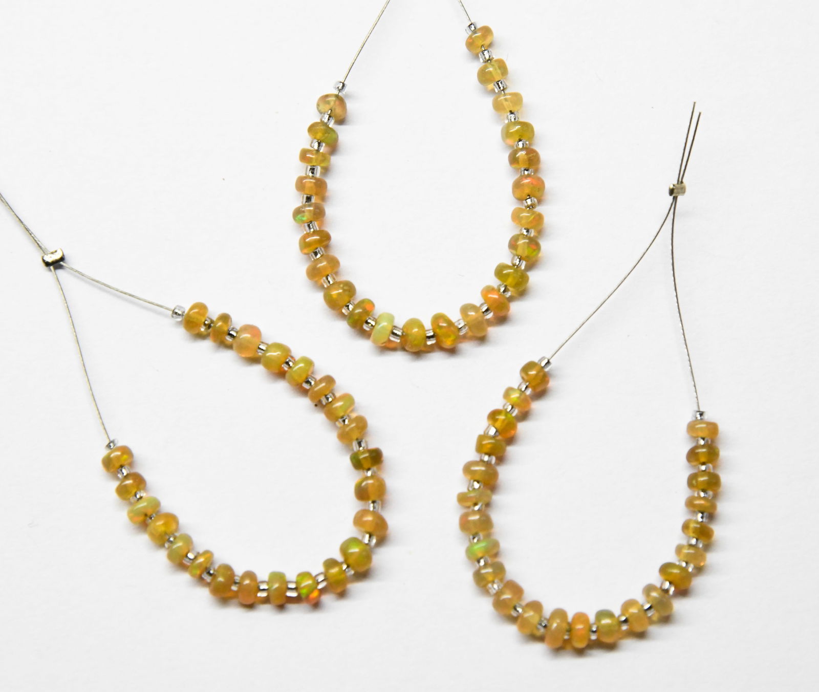 NATURAL ETHIOPIAN OPAL BEADS RONDELLE 3.5 - 4 MM 23 PCS - (3 TASSELS) (1 of 1)