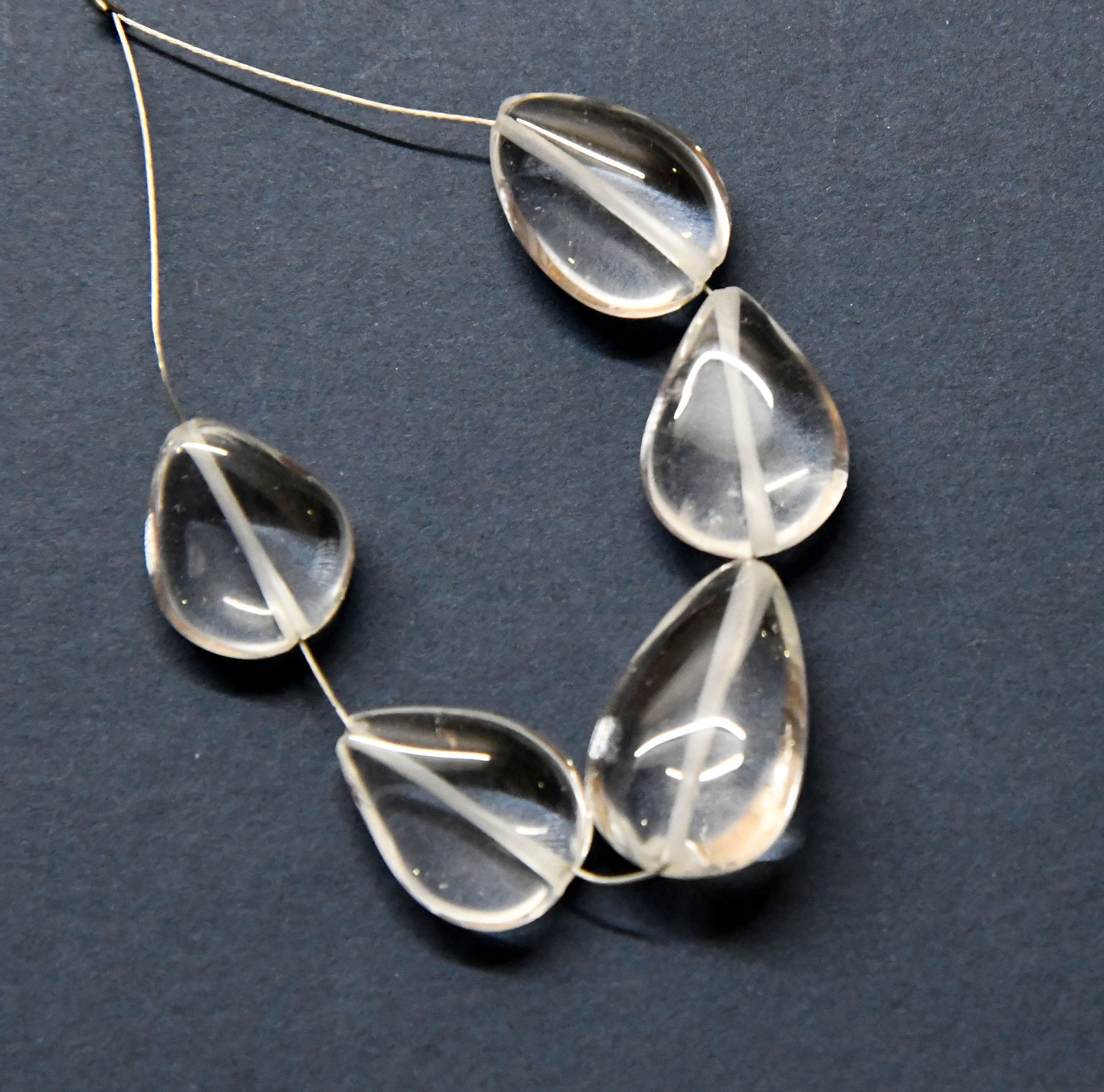 NATURAL CRYSTAL BEADS PEAR 12X16 - 12X19 MM: These are natural, earth mined and hand crafted with precision. Stone: Crystal, Stone Shape: Pear, Stone Size: 12x16 - 12.5x19 mm, Width: 6.5 - 8 mm, Weight: approx. 43 carats. The photographs are gen