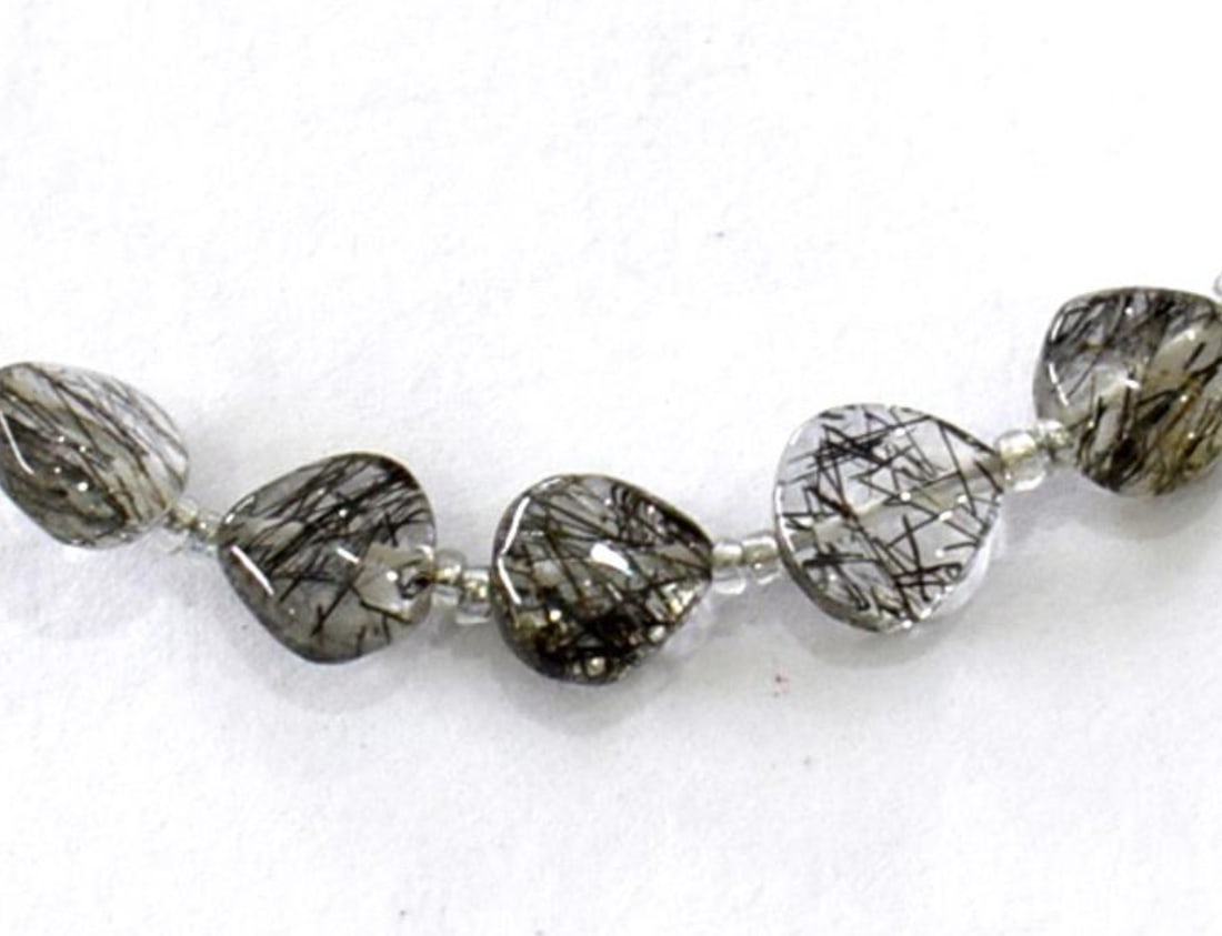NATURAL BLACK RUTILE BEADS HEART 7 MM 8 PCS - (4 TASSELS): These are natural, earth mined and hand crafted with precision. Stone: Black Rutile, Stone Shape: Heart, Stone Size: 7 mm, Width: 3.5 - 4 mm, Weight: approx. 11 carats. The photographs are generally e