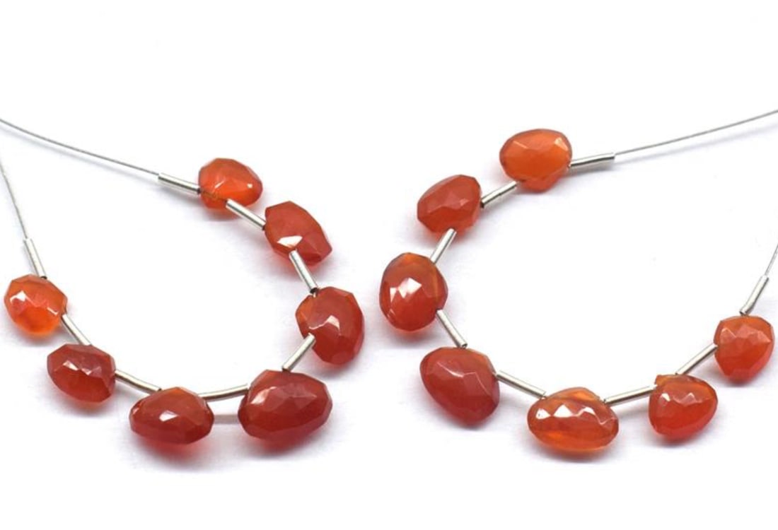 NATURAL CARNELIAN BEADS FACETED HEART 8.5 - 9 MM, 7 PCS - (3 TASSELS): These are natural, earth mined and hand crafted with precision. Stone: Carnelian, Stone Shape: Faceted Heart, Stone Size: 8.5 - 9 mm, Width: 3 - 4.5 mm, Weight: approx. 15.57 carats. The photographs a
