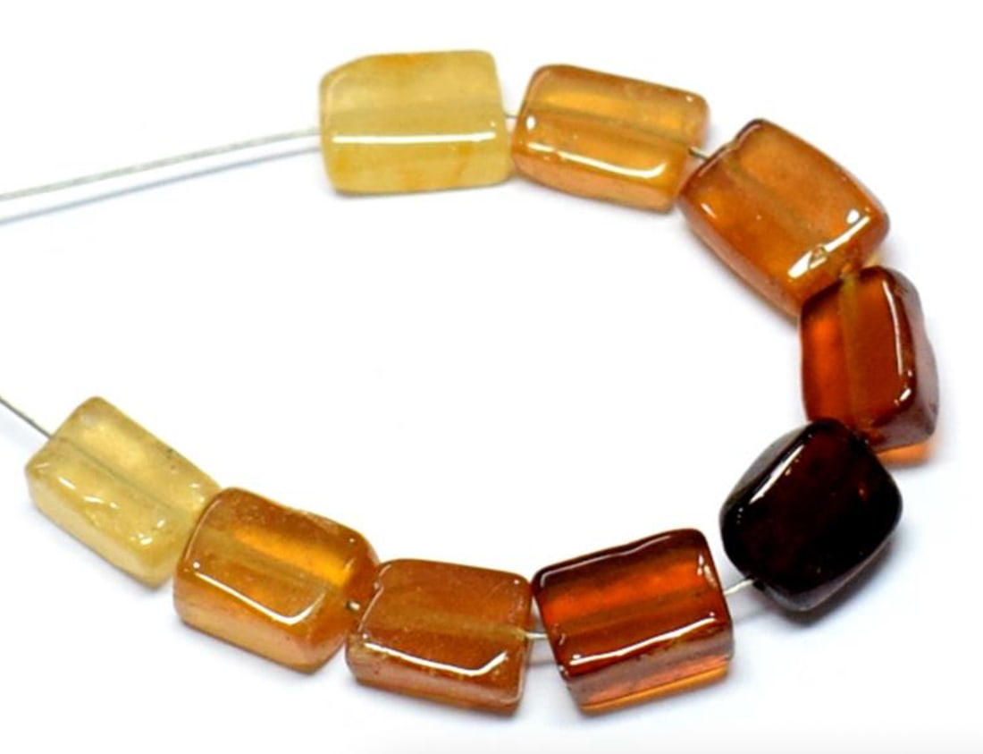 NATURAL HESSONITE GARNET BEADS CUBE 5X7 - 6X8 MM 9 PCS - (2 TASSELS): These are natural, earth mined and hand crafted with precision. Stone: Hessonite Garnet, Stone Shape: Cube, Stone Size: 5x7 - 6x8 mm, Width: 2.5 - 3 mm, Weight: approx. 18 carats. The photographs are