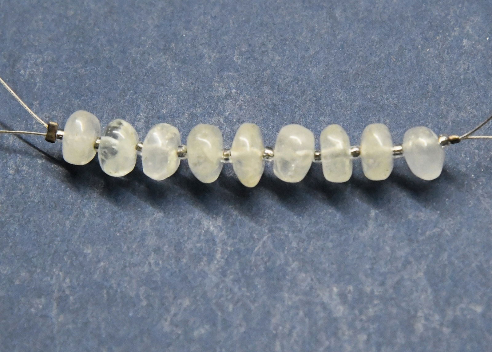 NATURAL AQUAMARINE BEADS RONDELLE 6.5 - 7.5 MM, 9 PCS: These are natural, earth mined and hand crafted with precision. Stone: Aquamarine, Stone Shape: Rondelle, Stone Size: 6.5 - 7.5 mm, Width: 3.5 - 4.5 mm, Weight: approx. 15 carats. The photographs are