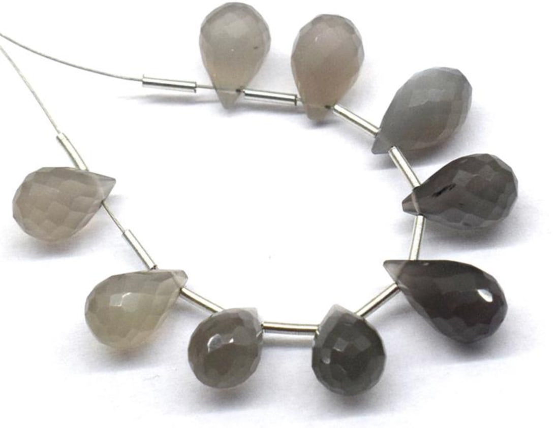 NATURAL GREY MOONSTONE BEADS FACETED BRIOLETTE 6X12 - 6.5X12 MM 9 PCS: These are natural, earth mined and hand crafted with precision. Stone: Grey Moonstone, Stone Shape: Faceted Briolette, Stone Size: 6x12 - 6.5x12 mm, Weight: approx. 23 carats. The photographs are gene