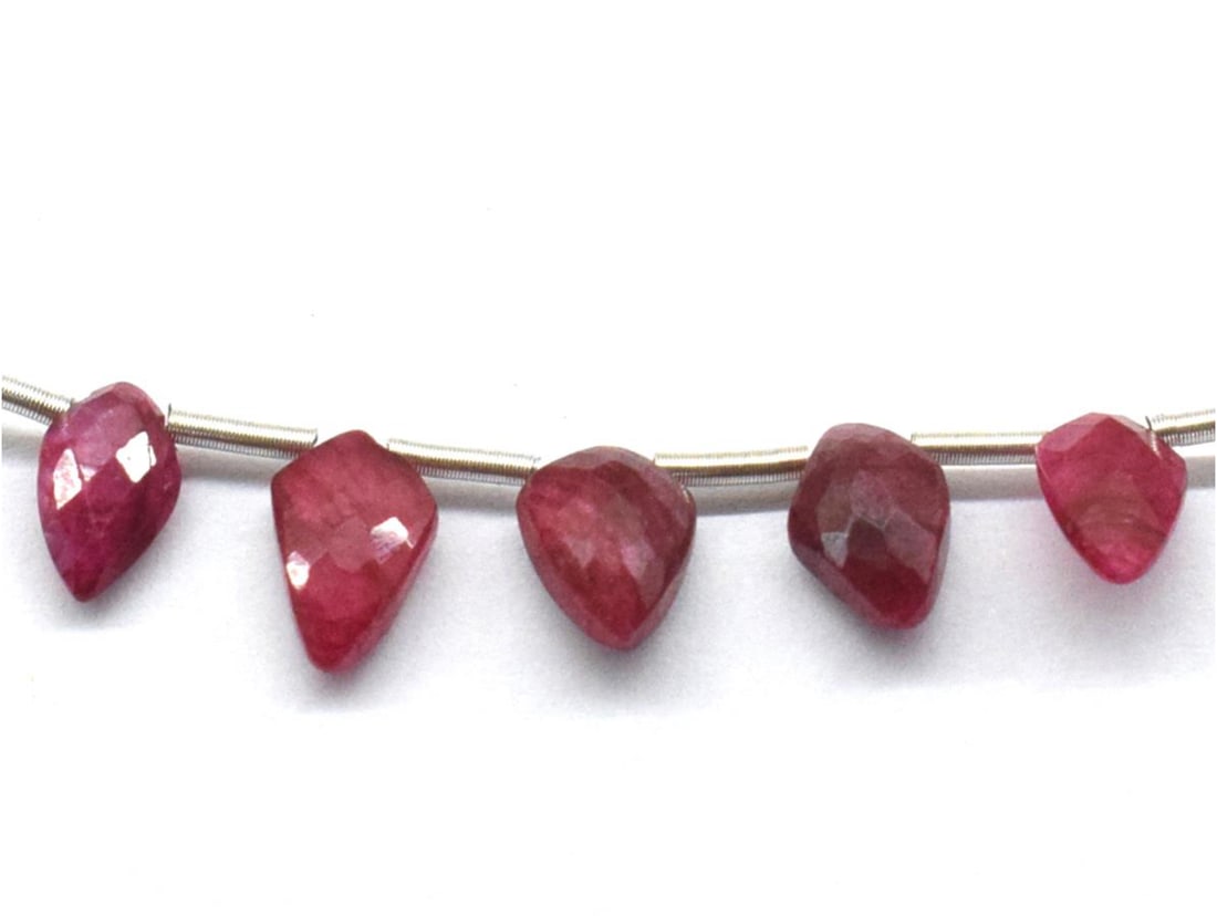 RUBY (DYED) BEADS FACETED FANCY 4X7 - 5X7.5 MM 5 PCS: These are natural, earth mined and hand crafted with precision. Stone: Ruby (Dyed), Stone Shape: Faceted Fancy, Stone Size: 4x7 - 5x7.5 mm, Width: 2 - 3 mm, Weight: approx. 5 carats. The photographs a