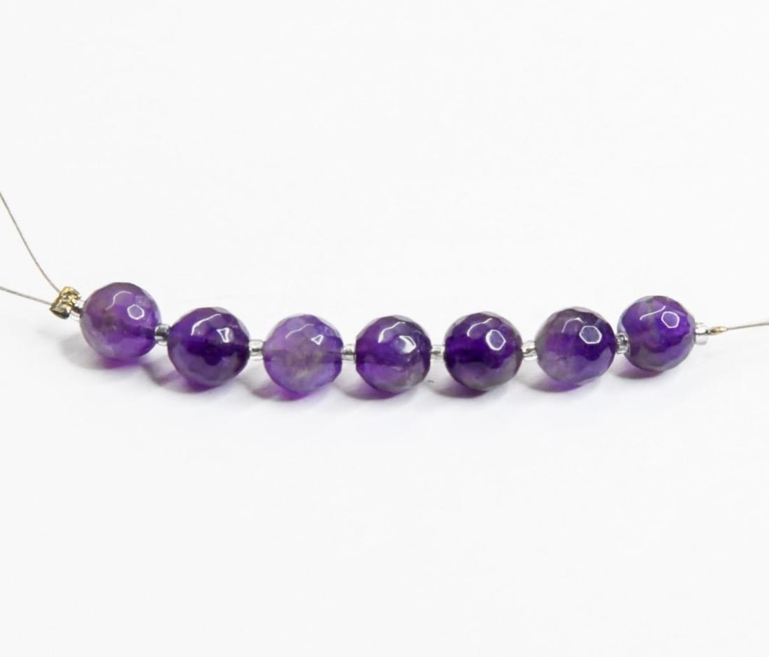 NATURAL AMETHYST BEADS FACETED ROUND 6 MM 7 PCS: These are natural, earth mined and hand crafted with precision. Stone: Amethyst, Stone Shape: Faceted Round, Stone Size: 6 mm, Weight: approx. 10 carats. The photographs are generally enlarged to show
