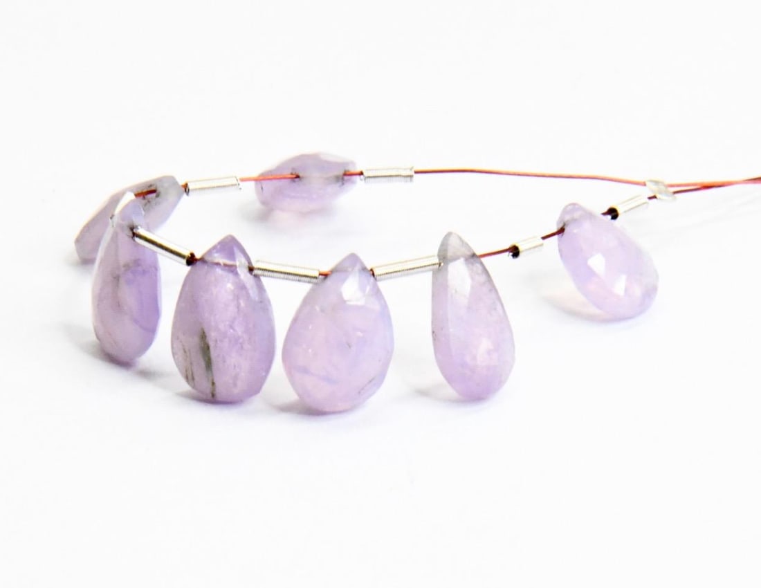 NATURAL SCOROLITE BEADS FACETED PEAR 6X9 - 7X11.5 MM 7 PCS: These are natural, earth mined and hand crafted with precision. Stone: Scorolite, Stone Shape: Faceted Pear, Stone Size: 6x9 - 7x11.5 mm, Width: 3.5 - 5.5 mm, Weight: approx. 14 carats. The photograph