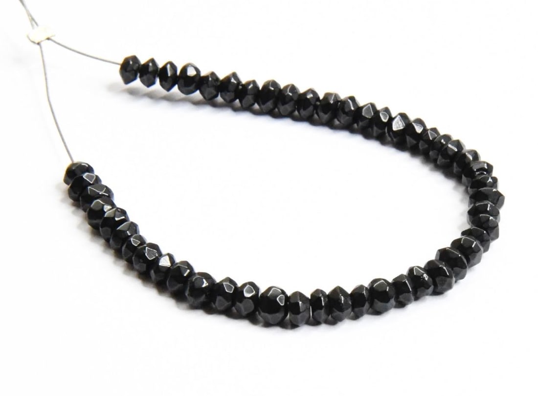 NATURAL BLACK SPINEL BEADS FACETED RONDELLE 3 MM 50 PCS: These are natural, earth mined and hand crafted with precision. Stone: Black Spinel, Stone Shape: Faceted Rondelle, Stone Size: 3 mm, Width: 1.5 - 2.5 mm, Weight: approx. 11 carats. The photographs ar
