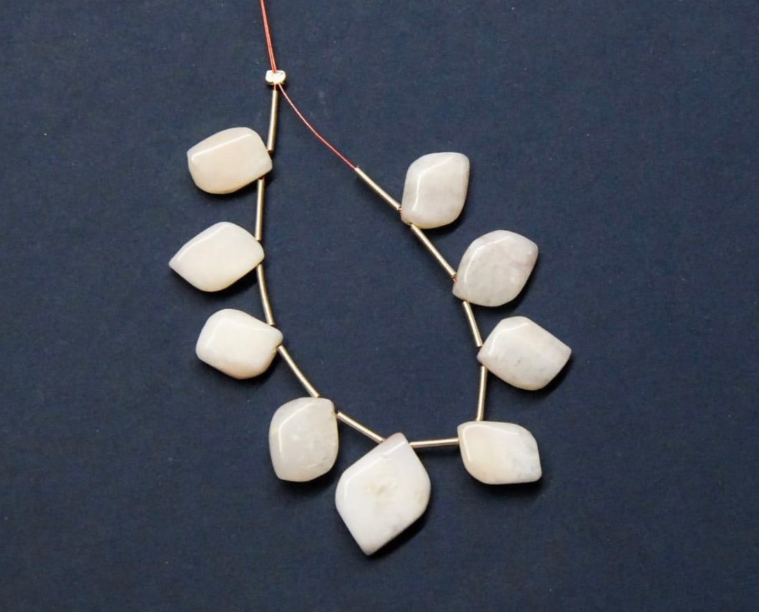 NATURAL PINK OPAL BEADS FANCY 8X11.5 - 11X17 MM, 9 PCS: These are natural, earth mined and hand crafted with precision. Stone: Pink Opal, Stone Shape: Fancy, Stone Size: 8x11.5 - 11x17 mm, Width: 3.5 - 4 mm, Weight: approx. 28 carats. The photographs are g