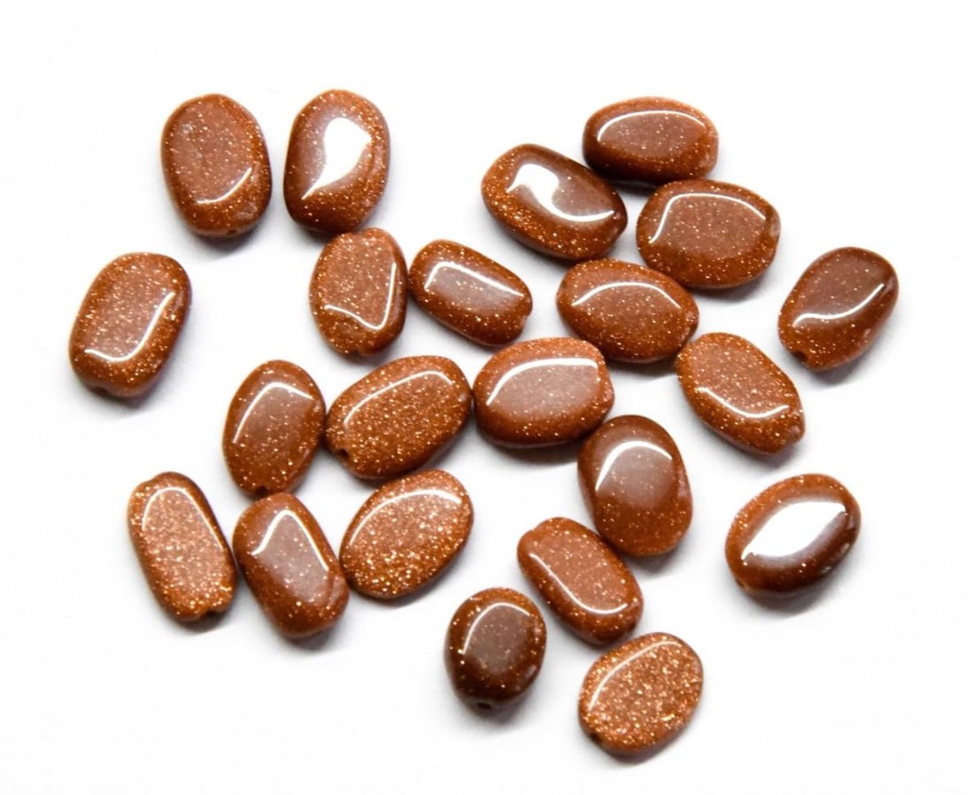 NATURAL GOLDSTONE BEADS OVAL 6X9 - 7X11 MM, 20 PCS (1 of 1)