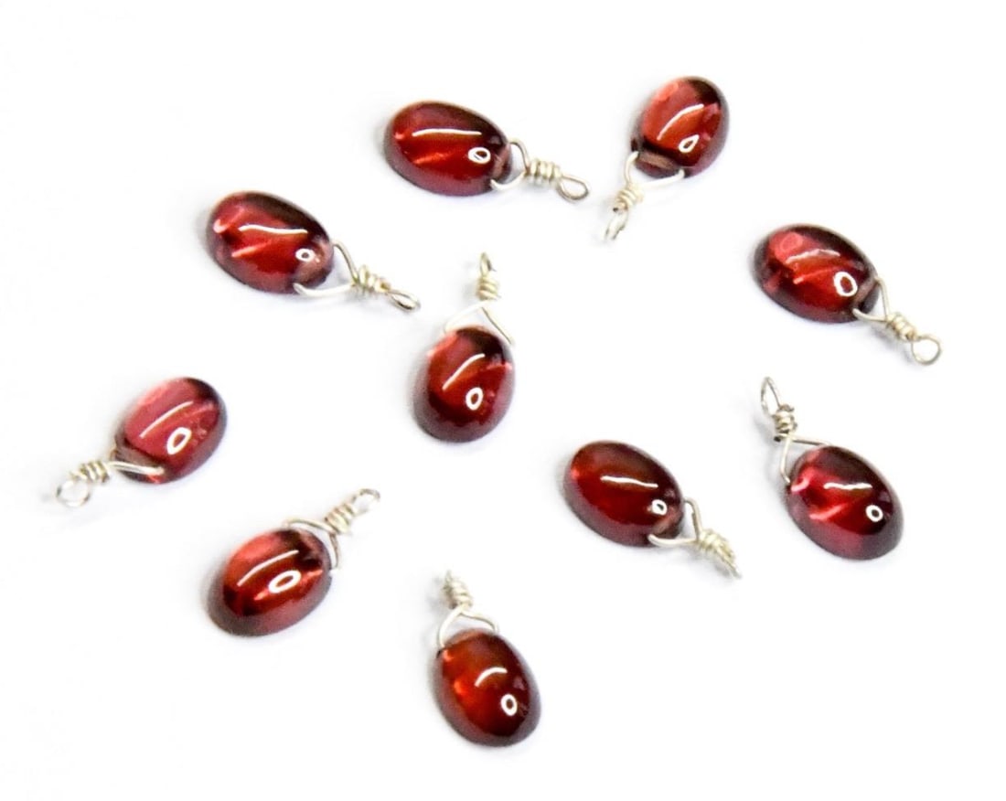 NATURAL GARNET BEADS CABOCHON OVAL 5X6.5 - 5X7 MM, 10 PCS: These are natural, earth mined and hand crafted with precision. Stone: Garnet, Stone Shape: Oval, Stone Size: 5x6.5 - 5x7 mm, Width: 2.5 - 3 mm, Weight: approx. 12 carats. The photographs are generall