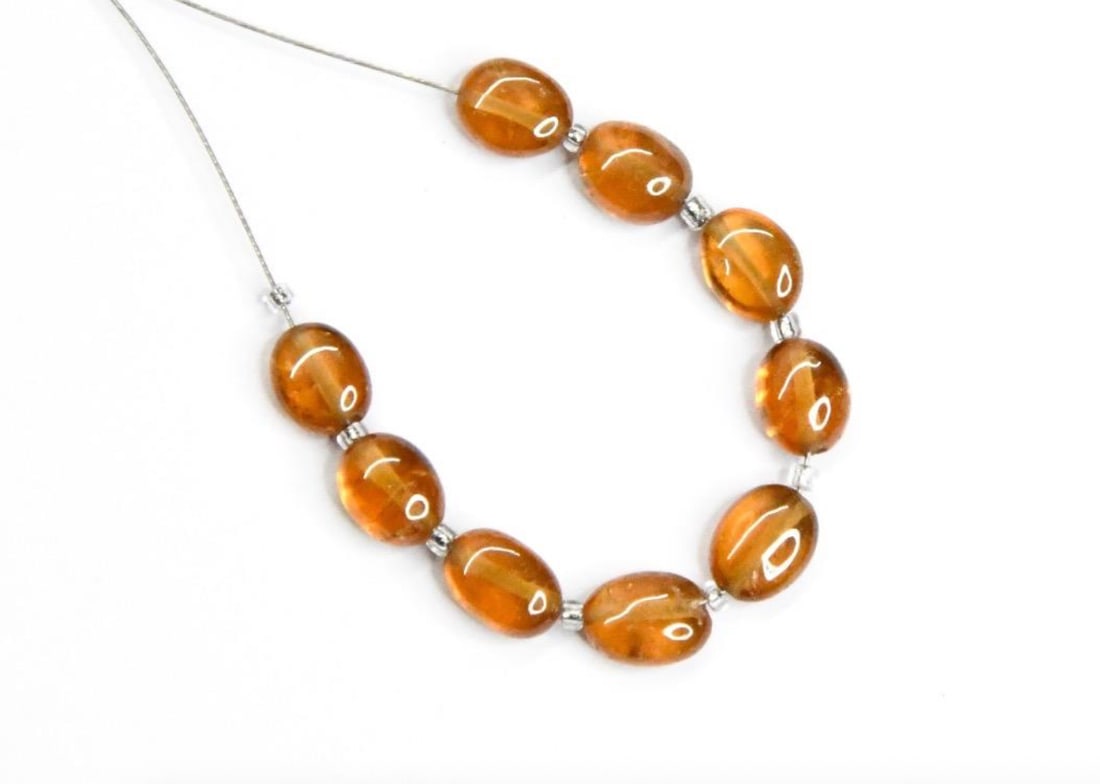 NATURAL HESSONITE GARNET BEADS OVAL 5X6.5 - 5X7 MM, 9 PCS (1 of 1)