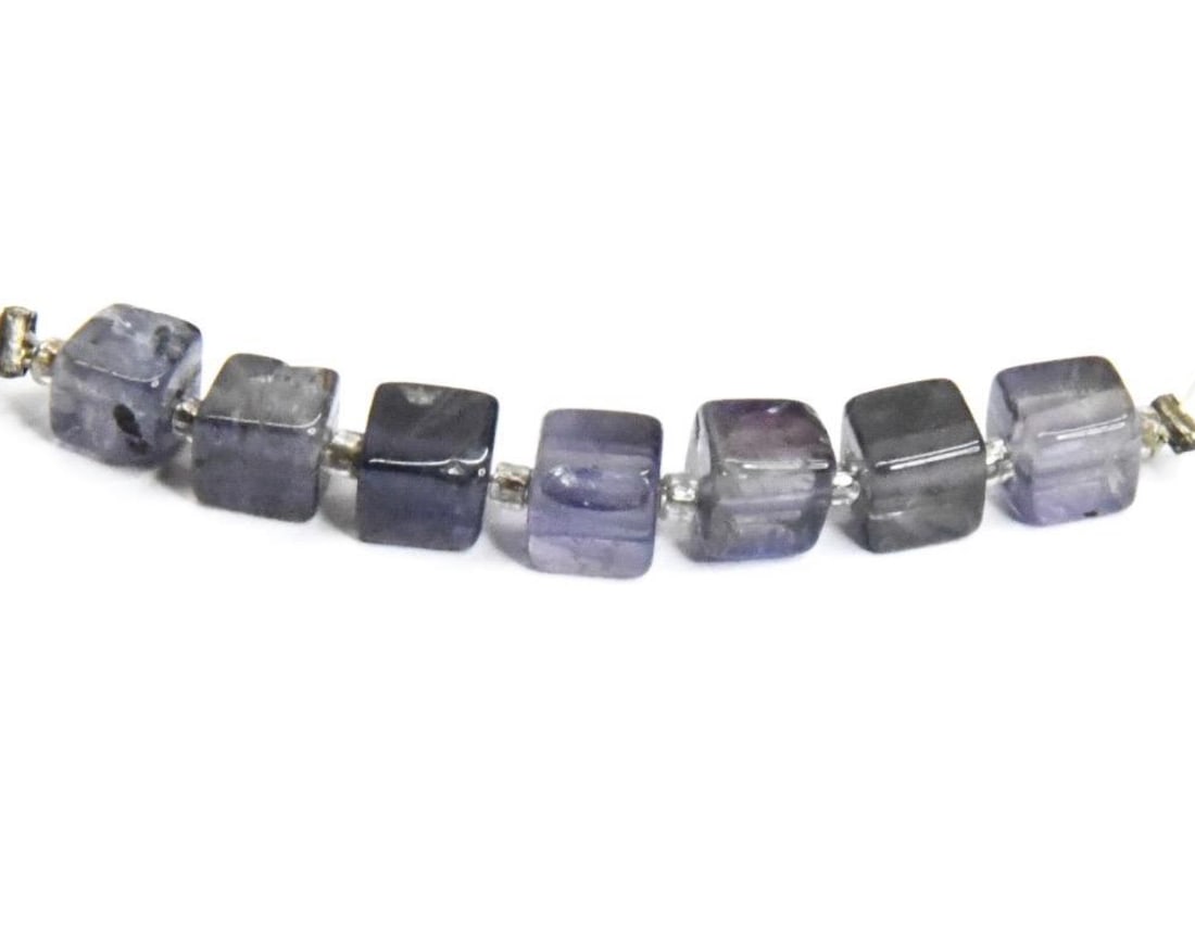 NATURAL IOLITE BEADS BOX 4 - 4.5 MM, 7 PCS: These are natural, earth mined and hand crafted with precision. Stone: Iolite, Stone Shape: Box, Stone Size: 4 - 4.5 mm, Width: 3 - 3.5 mm, Weight: approx. 5.50 carats. The photographs are generally e