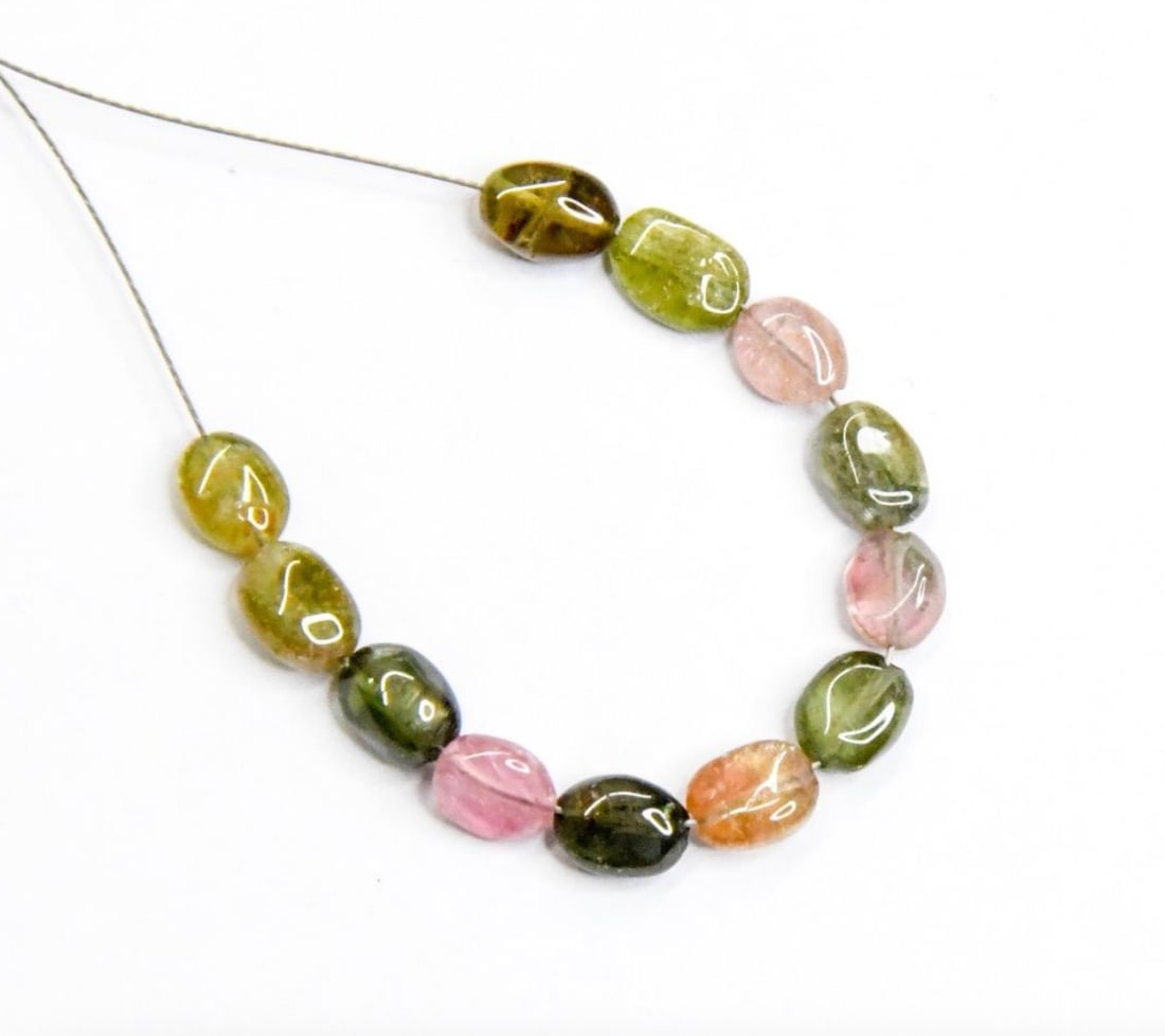 NATURAL MULTI TOURMALINE BEADS OVAL 4.5X5 - 4.5X6 MM, 12 PCS: These are natural, earth mined and hand crafted with precision. Stone: Multi Tourmaline, Stone Shape: Oval, Stone Size: 4.5x5 - 4.5x6 mm, Width: 2.5 - 3.5 mm, Weight: approx. 8.50 carats. The photogra