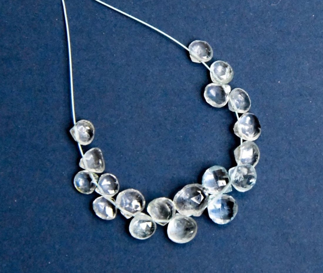 NATURAL AQUAMARINE BEADS FACETED HEART 4.5 - 6 MM, 19 PCS: These are natural, earth mined and hand crafted with precision. Stone: Aquamarine, Stone Shape: Faceted Heart, Stone Size: 4.5 - 6 mm, Width: 2 - 4 mm, Weight: approx. 10 carats. The photographs are g