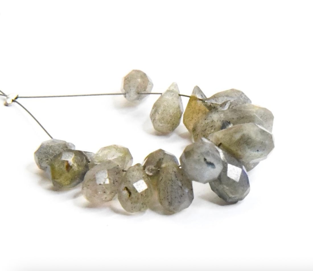 NATURAL LABRADORITE BEADS FACETED BRIOLETTE 5X7 - 6X11 MM, 17 PCS: These are natural, earth mined and hand crafted with precision. Stone: Labradorite, Stone Shape: Faceted Briolette, Stone Size: 5x7 - 6x11 mm, Weight: approx. 28 carats. The photographs are generally