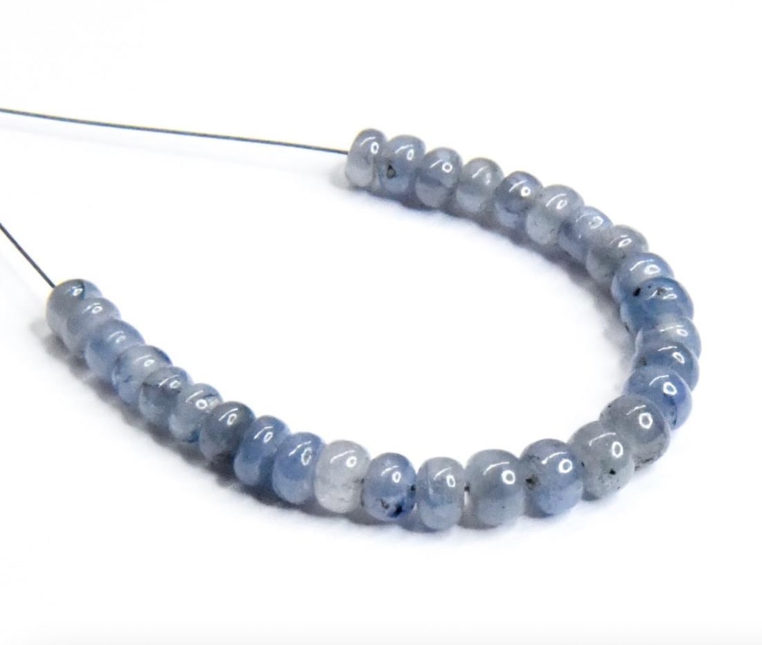 NATURAL TANZANITE BEADS RONDELLE 3.5 - 4.5 MM, 29 PCS (2 TASSELS): These are natural, earth mined and hand crafted with precision. Stone: Tanzanite, Stone Shape: Rondelle, Stone Size: 3.5 - 4.5 mm, Width: 1.5 - 3 mm, Weight: approx. 14 carats. The photographs are gen