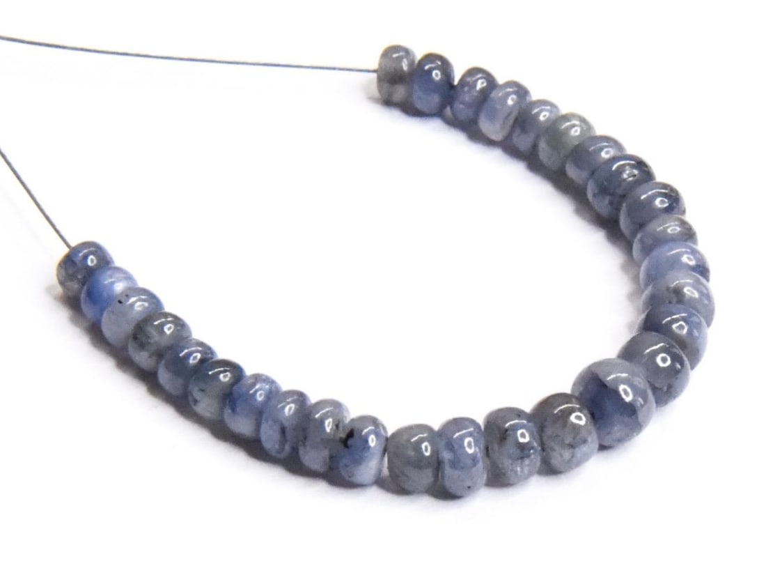 NATURAL TANZANITE BEADS RONDELLE 3.5 - 5 MM, 29 PCS (2 TASSELS): These are natural, earth mined and hand crafted with precision. Stone: Tanzanite, Stone Shape: Rondelle, Stone Size: 3.5 - 5 mm, Width: 1.5 - 3.5 mm, Weight: approx. 15 carats. The photographs are gen