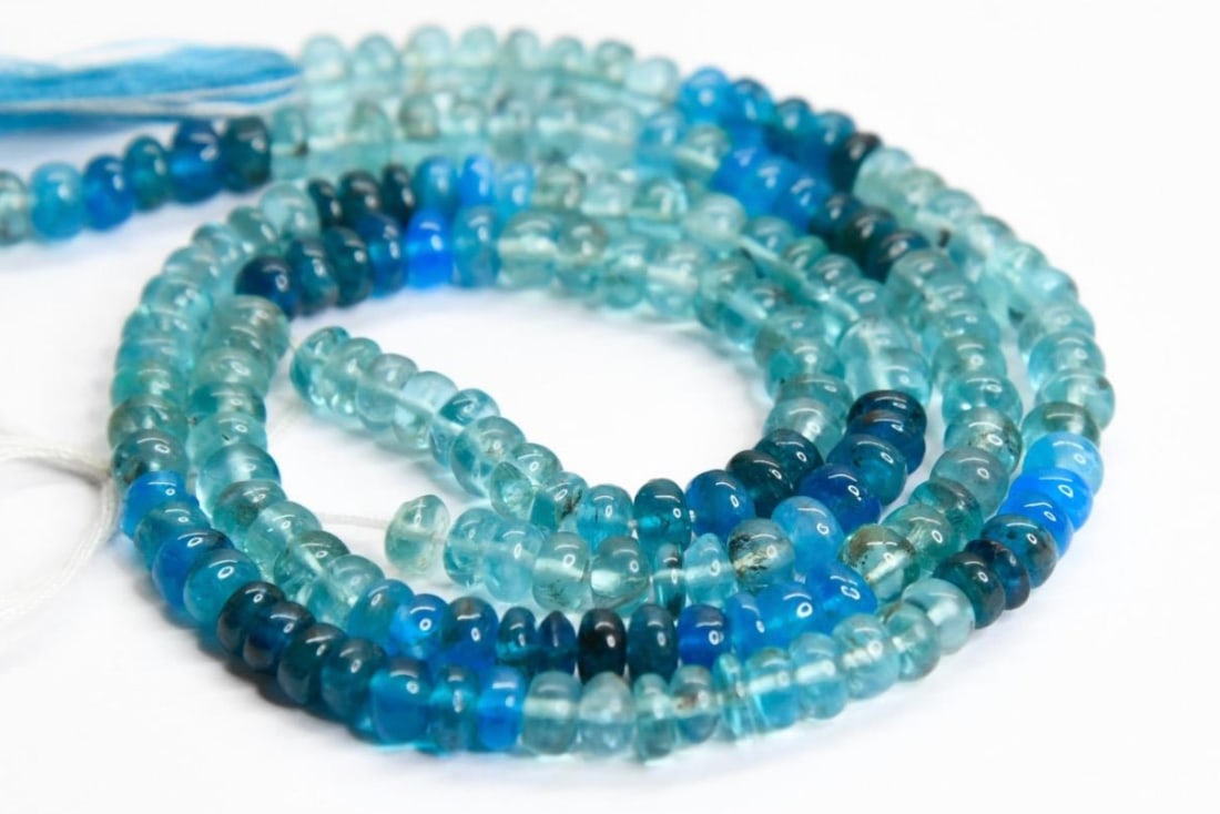 NATURAL APATITE BEADS (SHADED) RONDELLE 5 MM, 10" STRAND: These are natural, earth mined and hand crafted with precision. Stone: Apatite (Shaded), Stone Shape: Rondelle, Stone Size: 5 mm, Width: 2 - 3.5 mm, Weight: approx. 64 carats. The photographs are gene