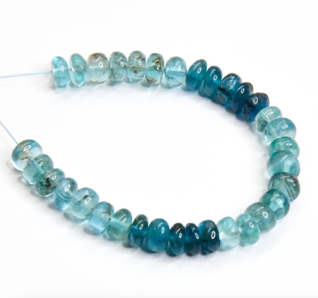 NATURAL APATITE BEADS (SHADED) RONDELLE 5 MM, 33 PCS: These are natural, earth mined and hand crafted with precision. Stone: Apatite (Shaded), Stone Shape: Rondelle, Stone Size: 5 mm, Width: 2 - 4 mm, Weight: approx. 27 carats. The photographs are genera