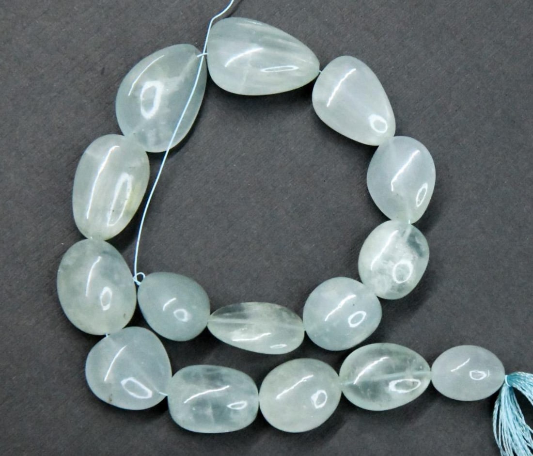 NATURAL AQUAMARINE BEADS TUMBLE 10X14 - 17X23 MM, 10" STRAND (1 of 2)