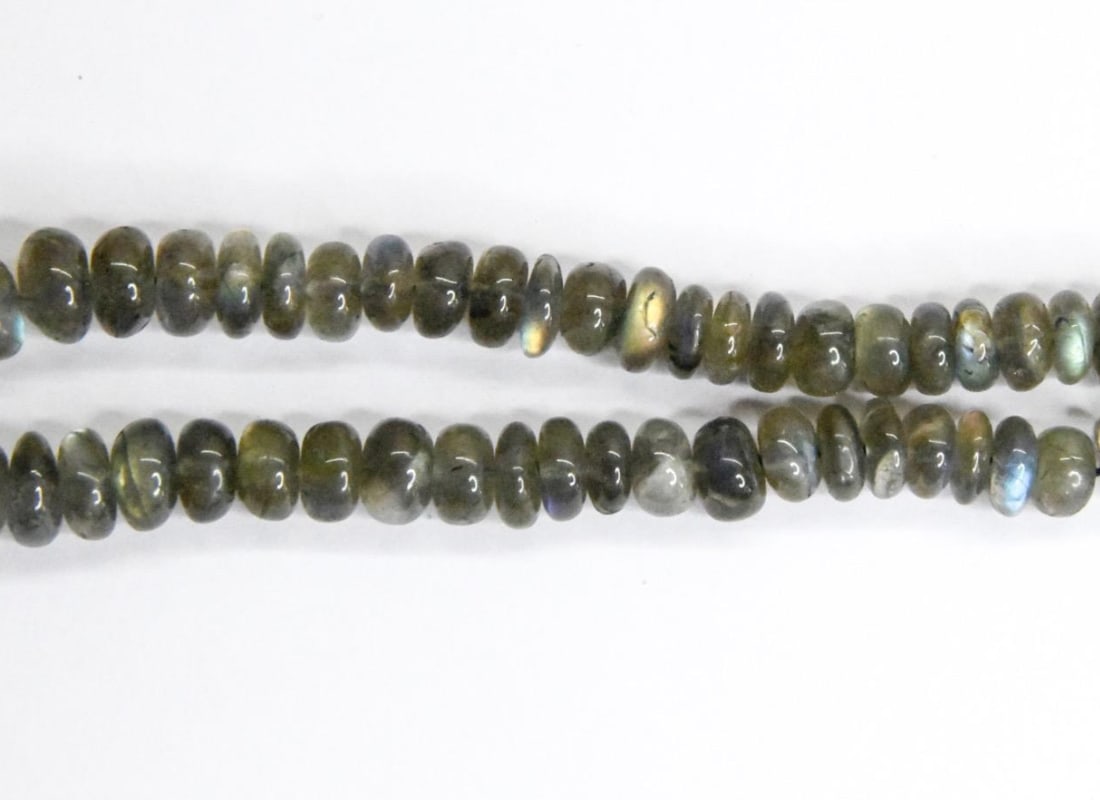 NATURAL LABRADORITE BEADS RONDELLE 7 - 12 MM, 10.5" STRAND: These are natural, earth mined and hand crafted with precision. Stone: Labradorite, Stone Shape: Rondelle, Stone Size: 7 - 12 mm, Width: 3 - 7 mm, Weight: approx. 177 carats. The photographs are gener