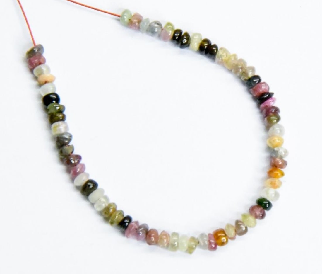 NATURAL MULTI TOURMALINE BEADS RONDELLE 2.5 MM, 61 PCS: These are natural, earth mined and hand crafted with precision. Stone: Multi Tourmaline, Stone Shape: Rondelle, Stone Size: 2.5 mm, Width: 1 - 2 mm, Weight: approx. 6 carats. The photographs are gener