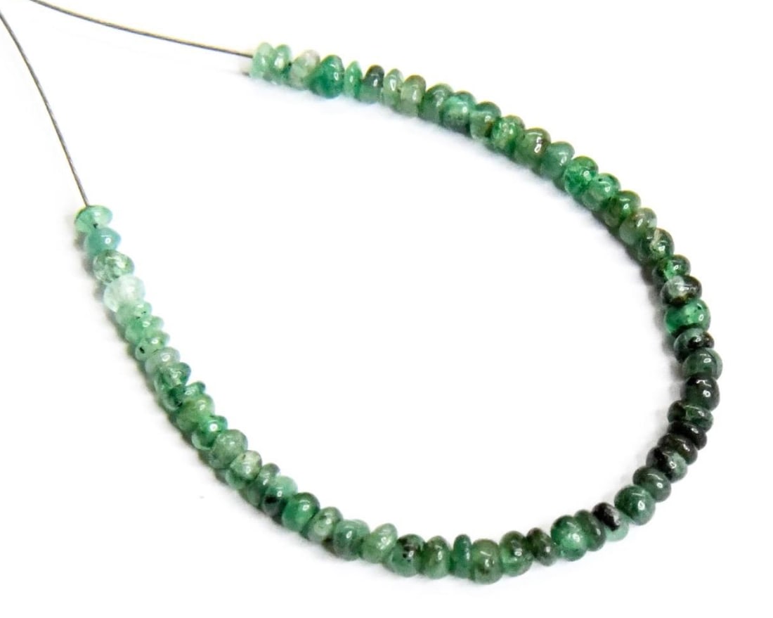 NATURAL EMERALD BEADS RONDELLE 2 - 2.5 MM, 60 PCS (3 TASSELS): These are natural, earth mined and hand crafted with precision. Stone: Emerald, Stone Shape: Rondelle, Stone Size: 2 - 2.5 mm, Width: 1 - 1.5 mm, Weight: approx. 4 carats. The photographs are generall