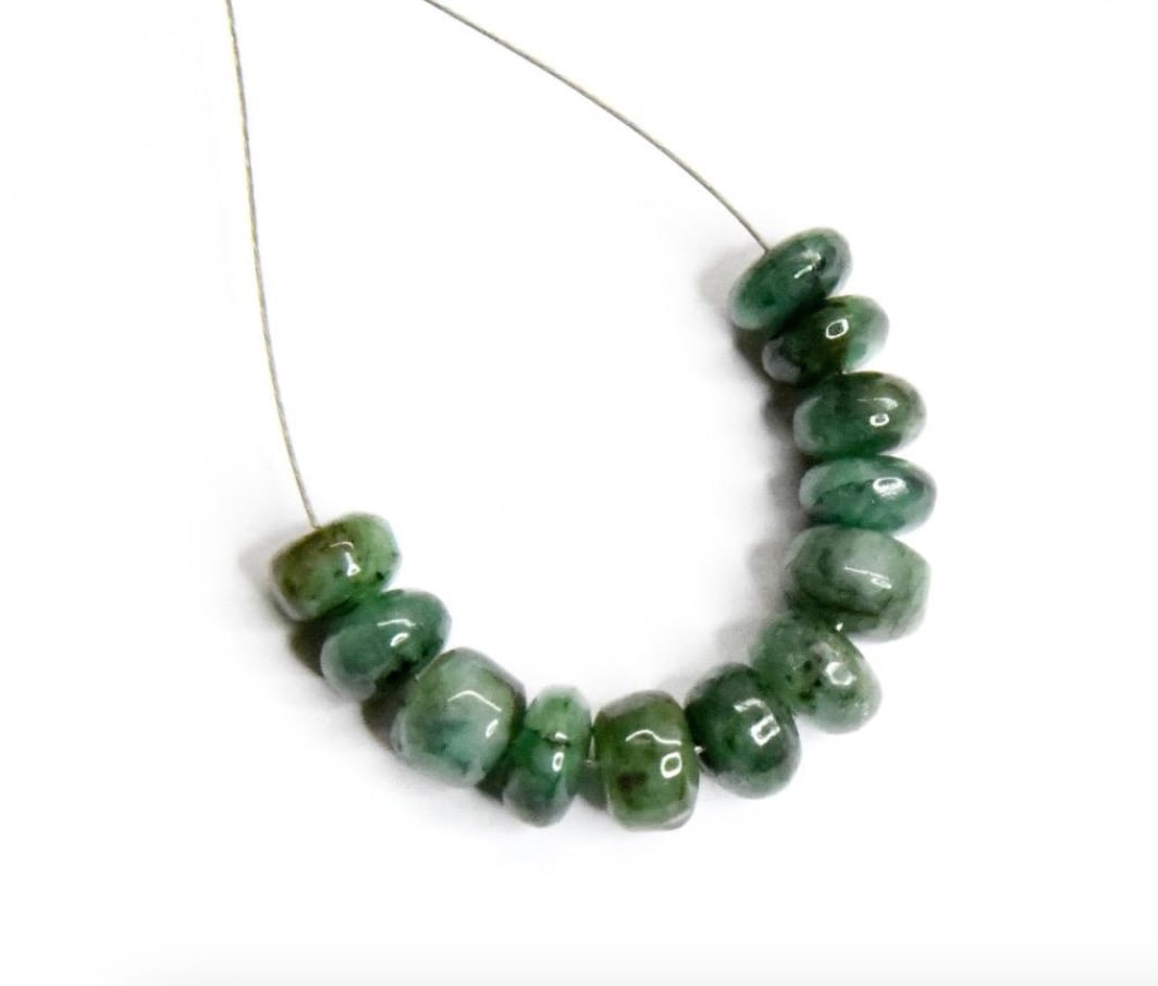 NATURAL EMERALD BEADS RONDELLE 5.5 - 6 MM, 12 PCS: These are natural, earth mined and hand crafted with precision. Stone: Emerald, Stone Shape: Rondelle, Stone Size: 5.5 - 6 mm, Width: 3 - 3.5 mm, Weight: approx. 11 carats. The photographs are general