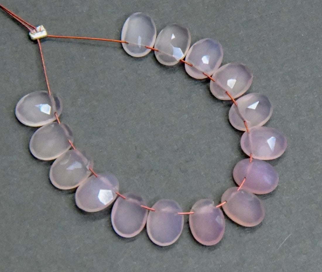 NATURAL CHALCEDONY BEADS FACETED OVAL 6X8 MM, 15 PCS (3 TASSELS): These are natural, earth mined and hand crafted with precision. Stone: Chalcedony, Stone Shape: Faceted Oval, Stone Size: 6x8 mm, Width: 3 - 4 mm, Weight: approx. 15 carats. The photographs are genera