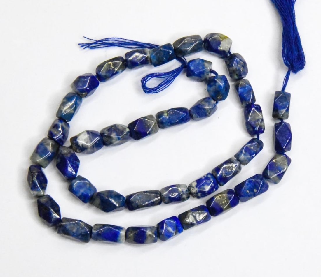 NATURAL LAPIS BEADS FACETED CUBE 4X6 - 5X7 MM, 11" STRAND (1 of 2)