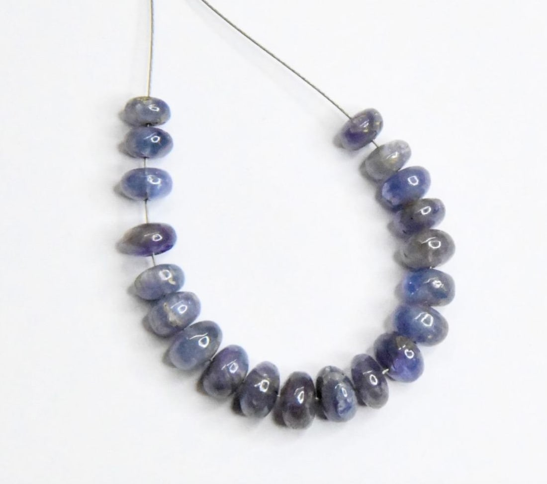 NATURAL TANZANITE BEADS RONDELLE 5 - 6 MM, 20 PCS: These are natural, earth mined and hand crafted with precision. Stone: Tanzanite, Stone Shape: Rondelle, Stone Size: 5 - 6 mm, Width: 2.5 - 3.5 mm, Weight: approx. 20 carats. The photographs are gener