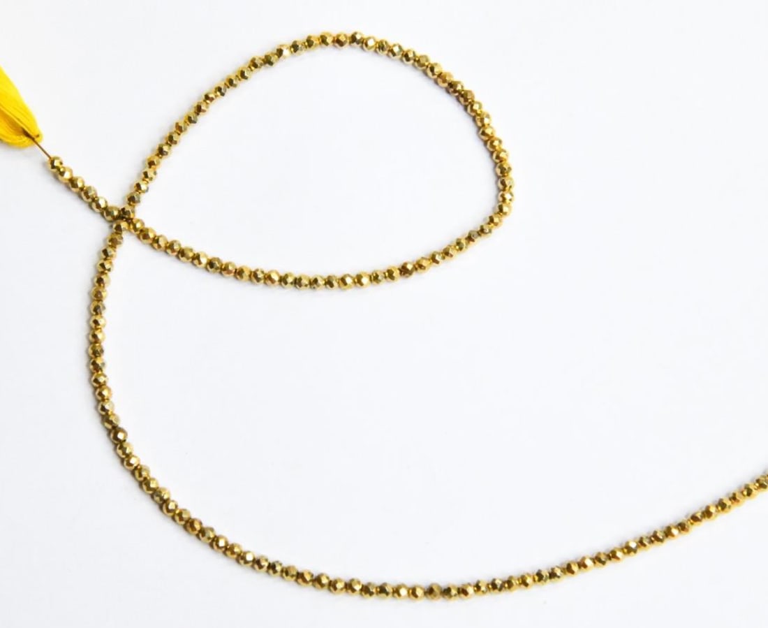 NATURAL PYRITE BEADS FACETED ROUND 2 MM, 10.5" STRAND: These are natural, earth mined and hand crafted with precision. Stone: Pyrite, Stone Shape: Faceted Round, Stone Size: 2 mm, Weight: approx. 14 carats. The photographs are generally enlarged to show t