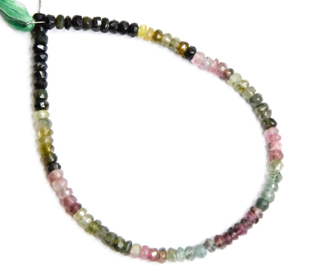 NATURAL MULTI TOURMALINE BEADS FACETED RONDELLE 3.5 MM, 7.5" STRAND: These are natural, earth mined and hand crafted with precision. Stone: Multi Tourmaline, Stone Shape: Faceted Rondelle, Stone Size: 3.5 mm, Width: 1.5 - 2.5 mm, Weight: approx. 23 carats. The photogra