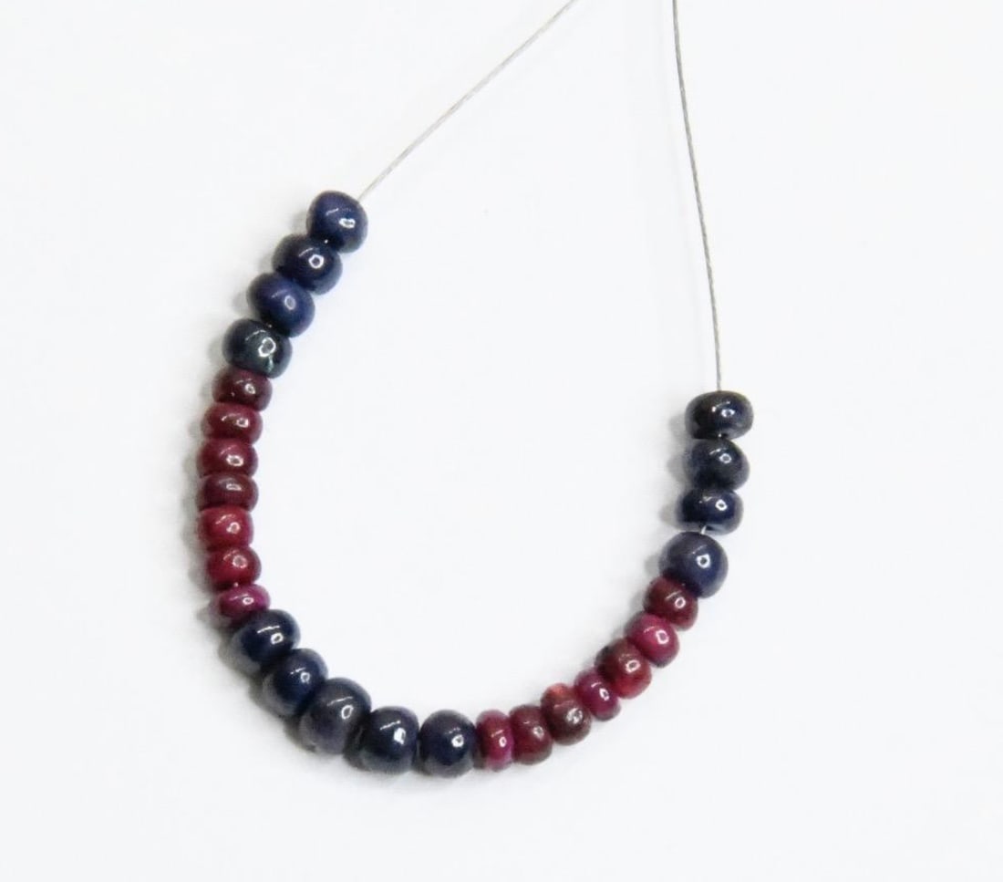 NATURAL RUBY & SAPPHIRE BEADS (DYED) RONDELLE 3 - 4 MM, 27 PCS: These are natural, earth mined and hand crafted with precision. Stone: Ruby/Sapphire (Dyed), Stone Shape: Rondelle, Stone Size: 3 - 4 mm, Width: 1.5 - 3 mm, Weight: approx. 11 carats. The photographs