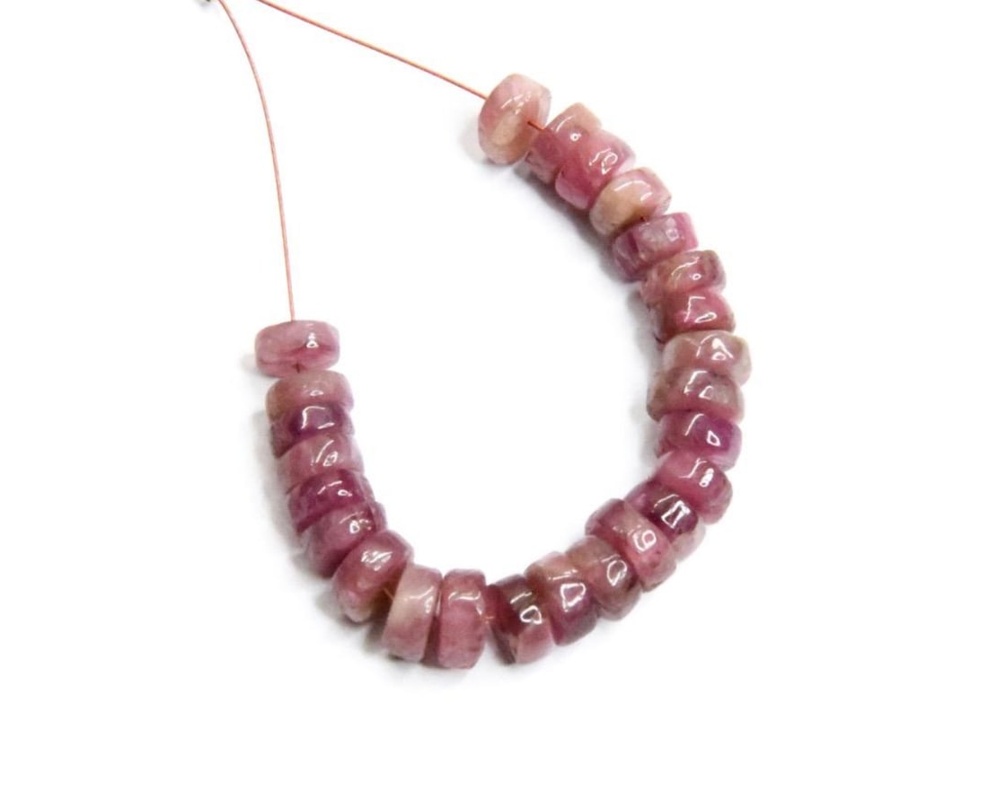 NATURAL PINK TOURMALINE BEADS TYRE 5 - 6 MM, 25 PCS: These are natural, earth mined and hand crafted with precision. Stone: Pink Tourmaline, Stone Shape: Tyre, Stone Size: 5 - 6 mm, Width: 2 - 3 mm, Weight: approx. 22 carats. The photographs are general